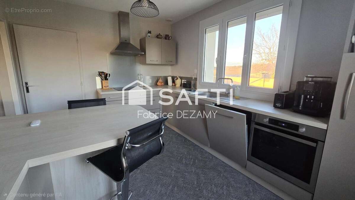 Photo 2 - Maison à LES MAGNILS-REIGNIERS