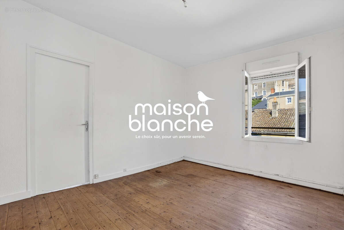 chambre logement 1 - Appartement à AIRVAULT