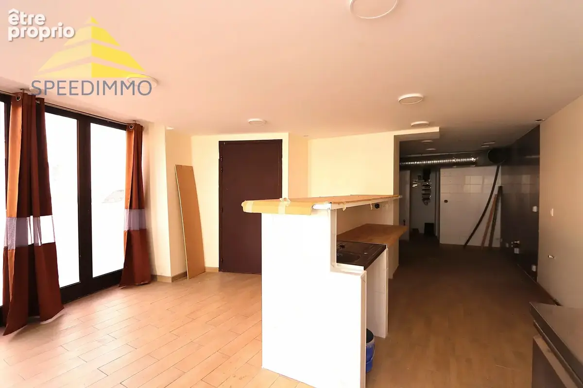 Immeuble de rapport – commerce + 3 appartements - photo 3