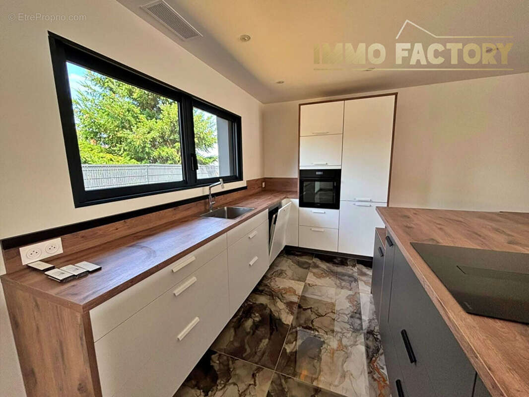 Maison plain-pied 5 pieces 125 m² saint-alban-les-eaux - photo 4
