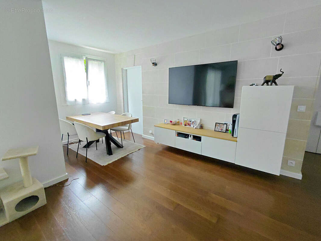 Appartement  76 m² en rez-de-jardin (3 chambres) - photo 2