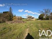 Photo 1 - Terrain à CAOUENNEC-LANVEZEAC