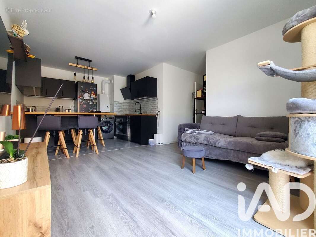 Photo 3 - Appartement à VOISINS-LE-BRETONNEUX