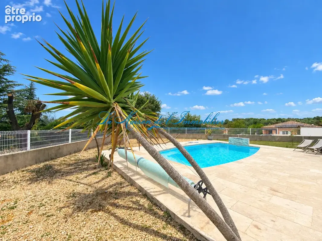 LEDIGNAN, villa avec de belles finitions de type F4 avec piscine chauffée sur 2026 m2 de terrain paysagé - photo 2