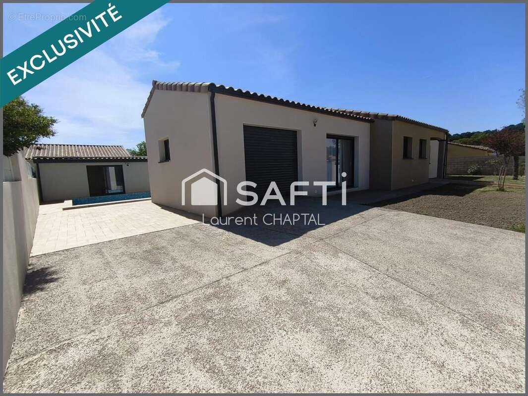 Photo 2 - Maison à VILLEMOUSTAUSSOU