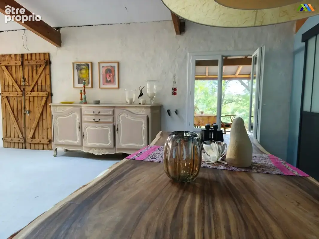Characterful dining area with views towards the garden and surrounding countryside