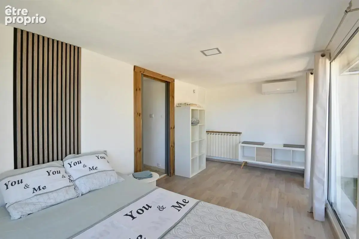 Maison de 5 pièces de 104 m² à Saint-Julien-les-Rosiers - photo 10