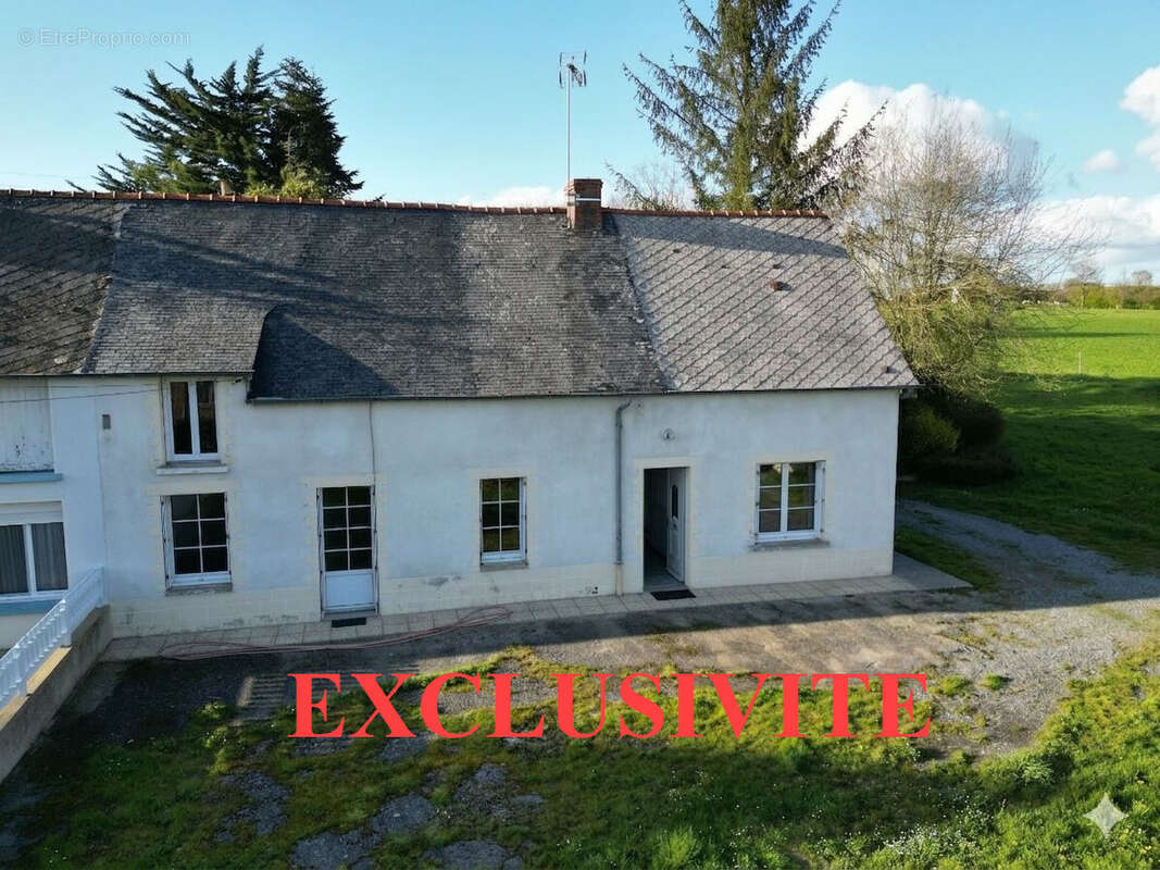 GeminiGeneratedImagewynl8rwynl8rwynl - Maison à PIPRIAC