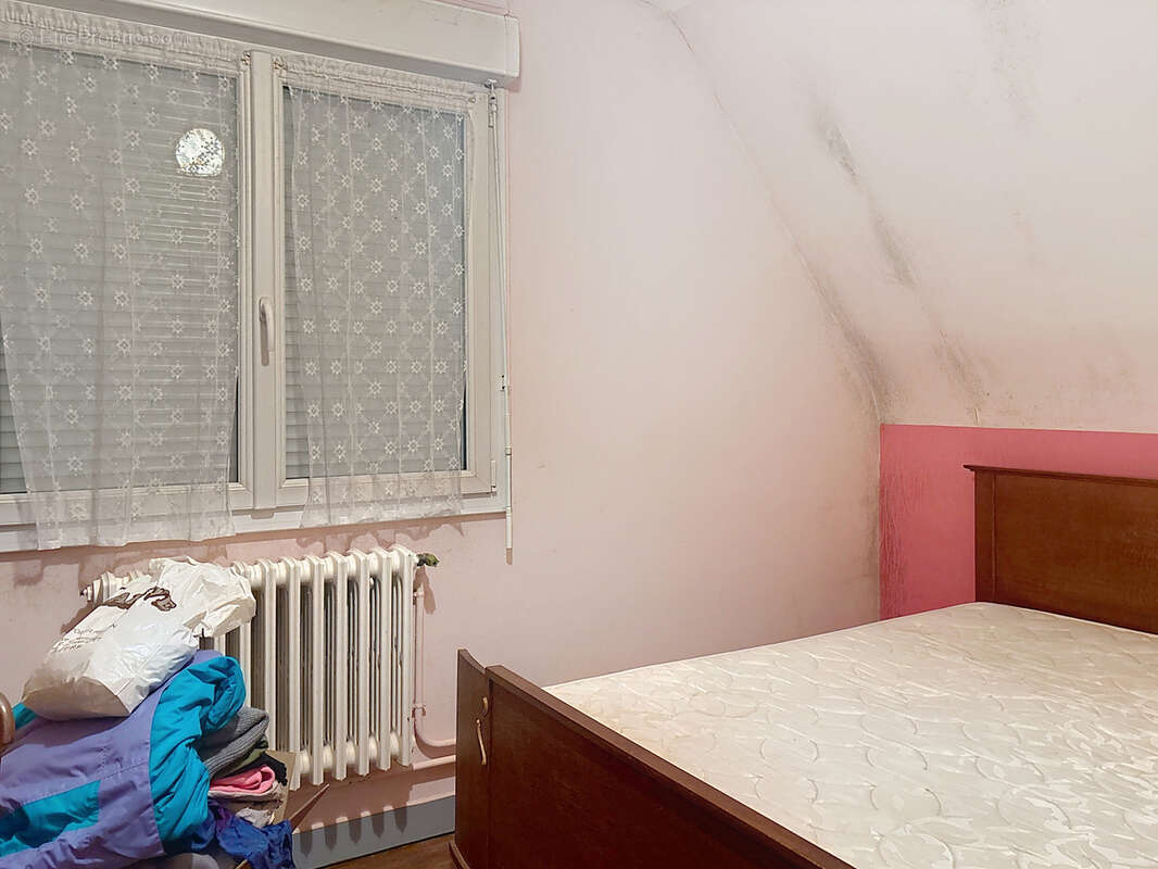 Maison à JUVIGNY-LE-TERTRE