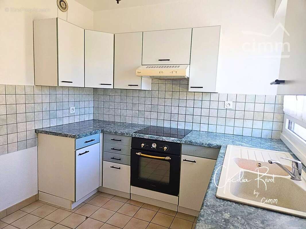 Appartement T4 lumineux de 82 m² avec balcon - photo 4