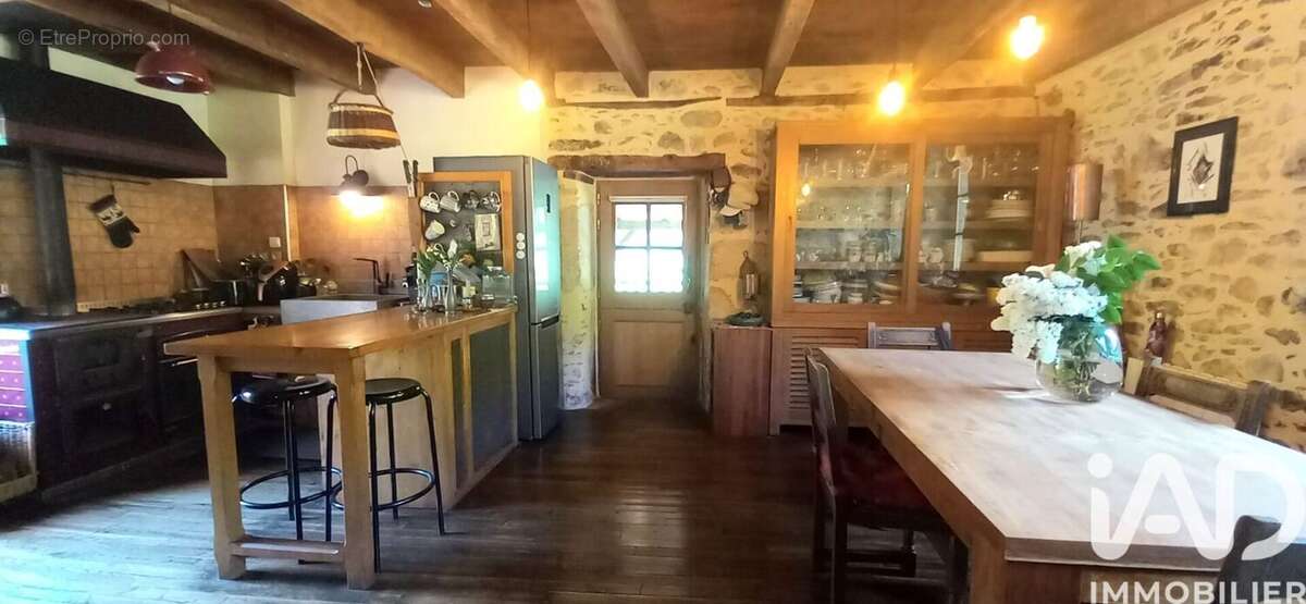 Photo 6 - Maison à LATOUILLE-LENTILLAC