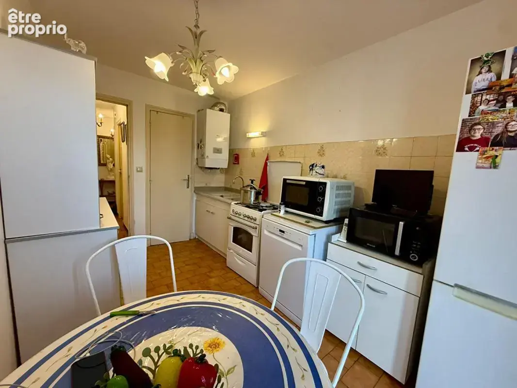 Appartement T3 de 77 m² vendu occupé avec terrasse parking et cave résidence avec ascenseur quartier Iéna Carcassonne - photo 10
