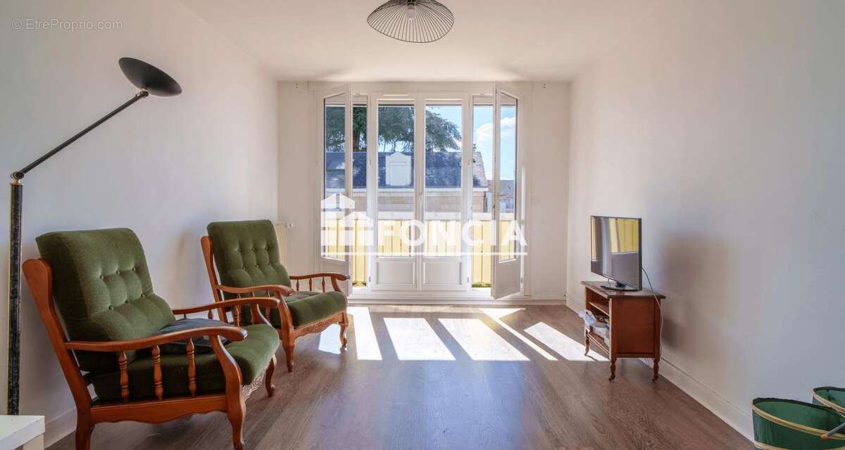 Appartement T3 de 64 m² avec balcons, parking et cave – Rue Casimir Rançon - photo 5