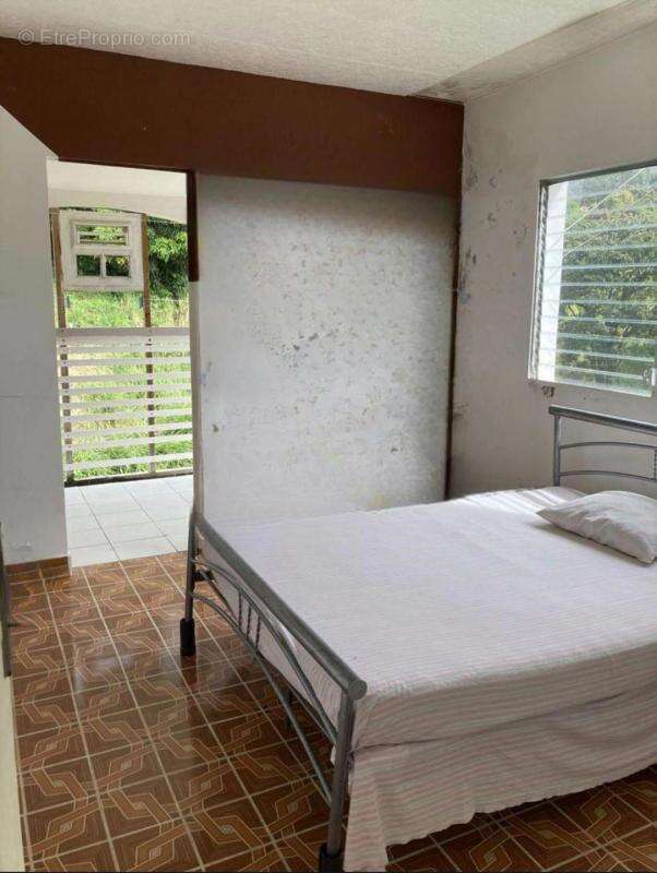 À vendre : Maison spacieuse de 187 m² à Morne Vert (97226) - Idéal pour le tourisme vert ! - photo 9