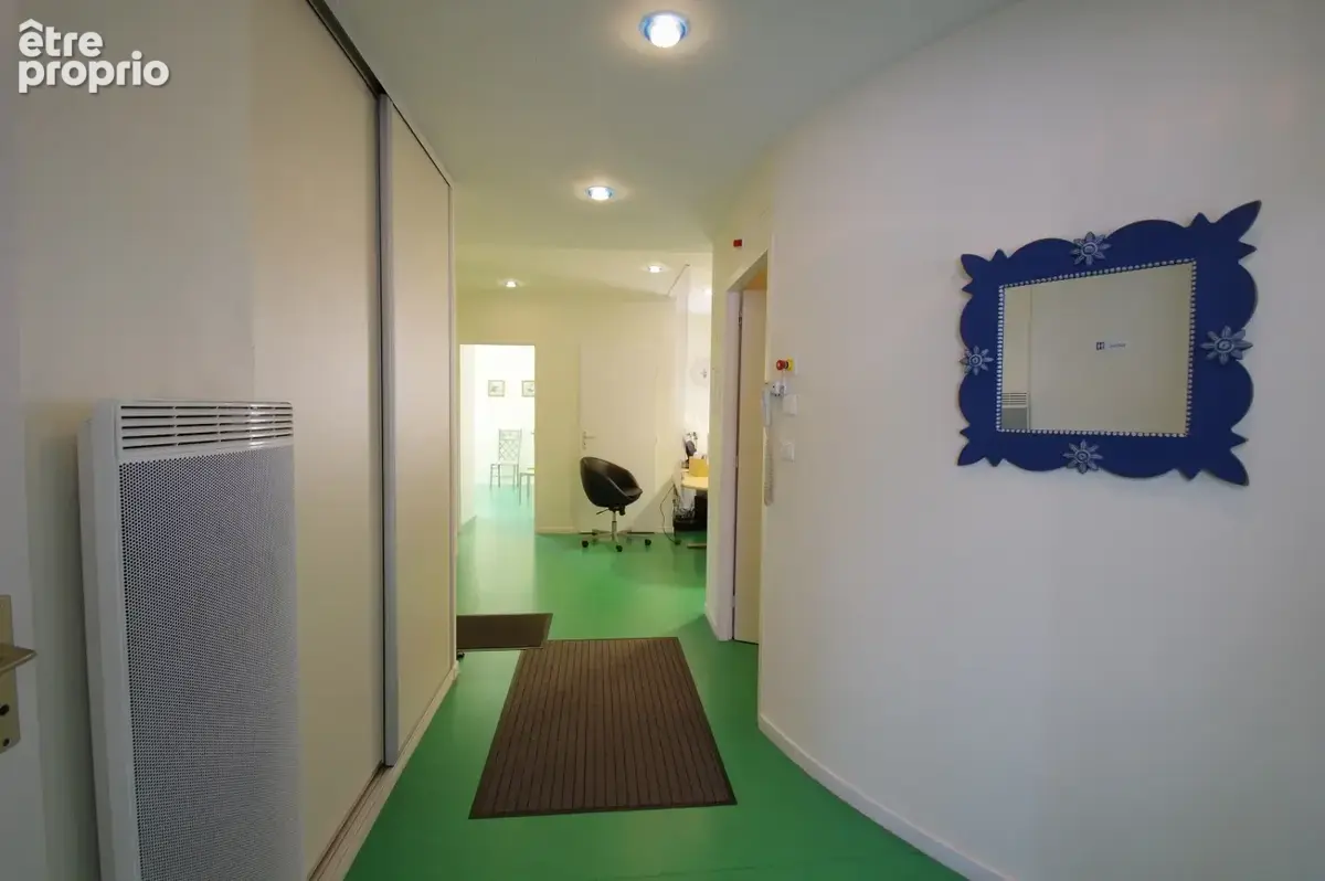 Local professionnel de 95,16 m2 en RDC - photo 7