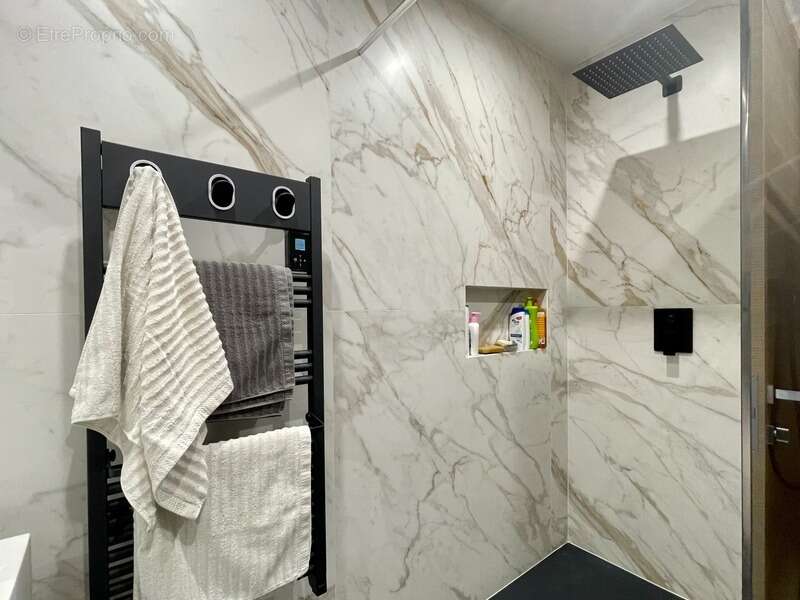 Appartement en rez-de-jardin, au calme, rénové - photo 10