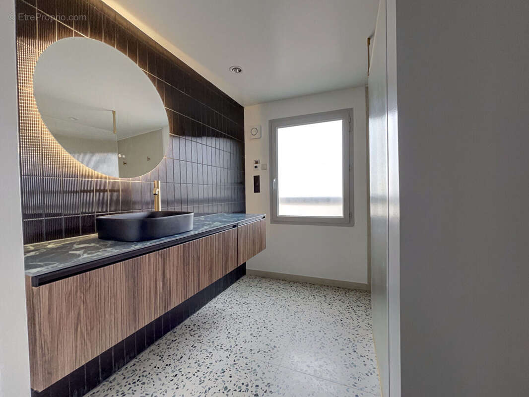 Duplex d'exception avec terrasse de 25m², spa et volumes rares - photo 12