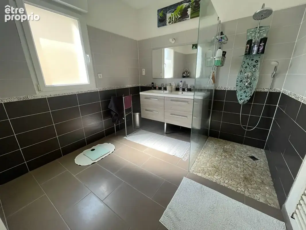 Maison individuelle 155 m² - 4 chambres - Jardin - Garage - photo 8