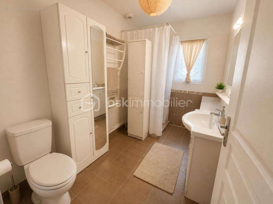 Maison de plain-pied 76 m² – 2 chambres – Jardin de 668 m² – Vendue louée – Rétaud - photo 7