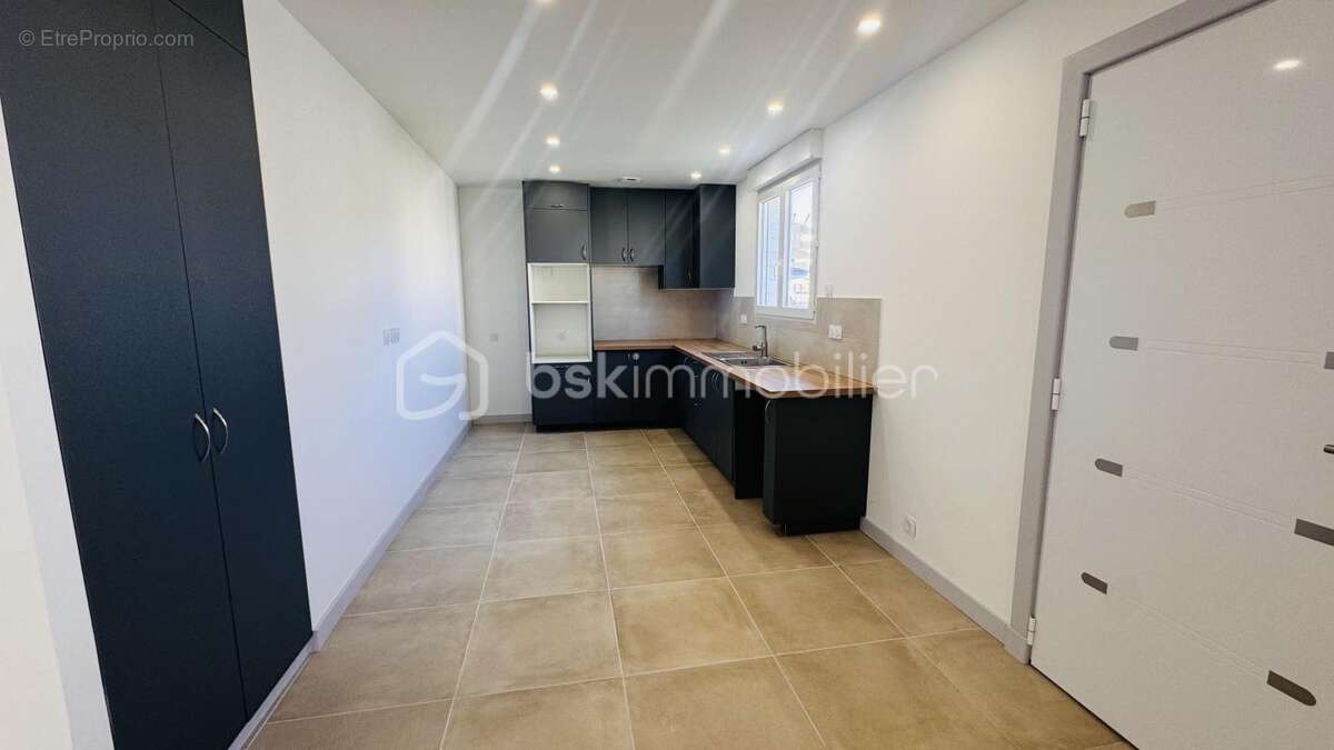 Plain-pied bois 100 m² – 3 chambres – Terrasse & jardin – Proche Rance - photo 4