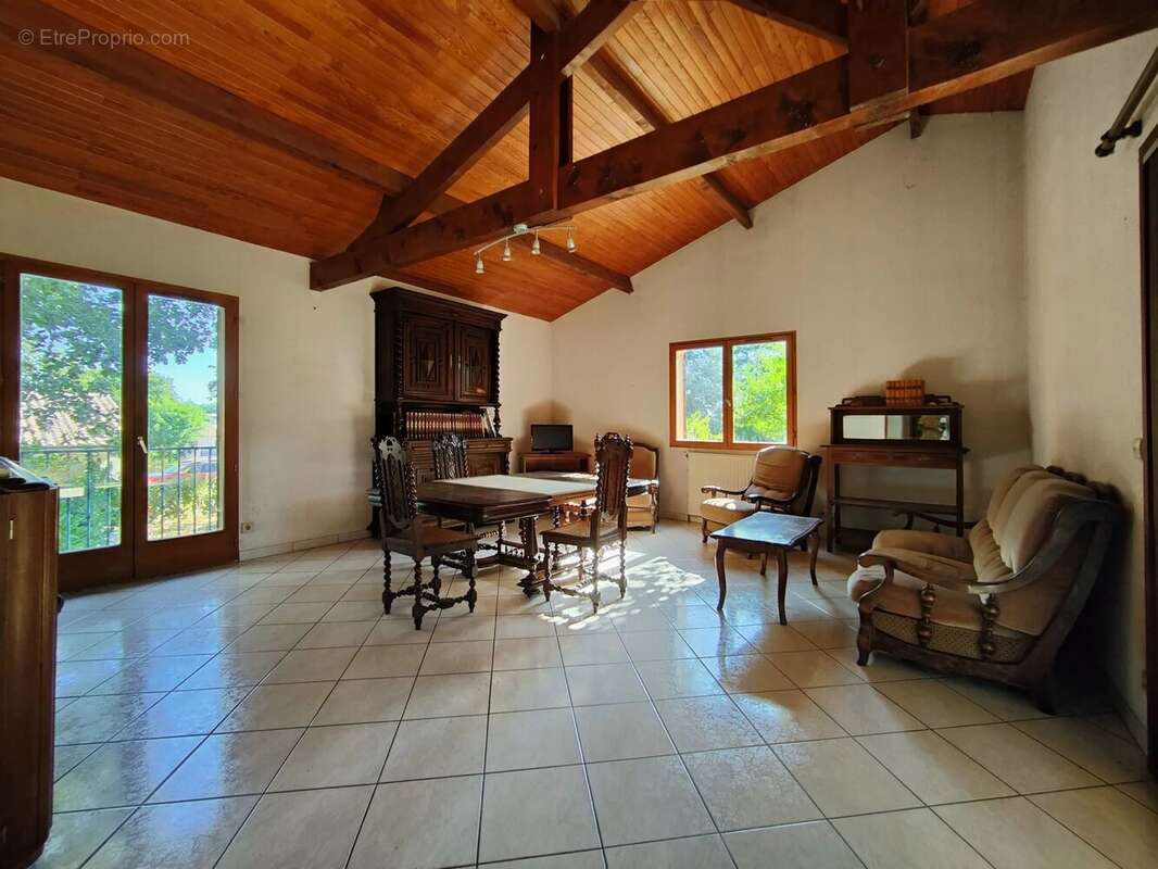 AYGUEMORTE LES GRAVES, Maison de 91 m² sur 832 m² - photo 6
