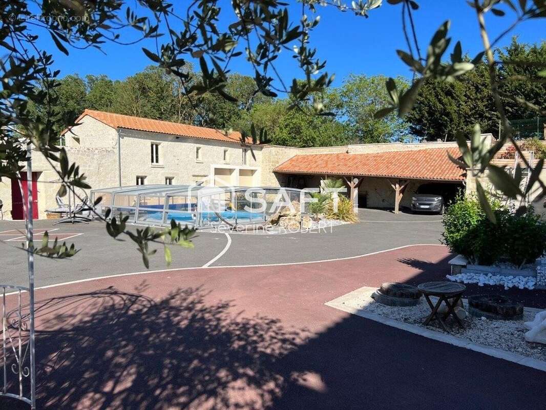 Photo 2 - Maison à LES TROIS-MOUTIERS