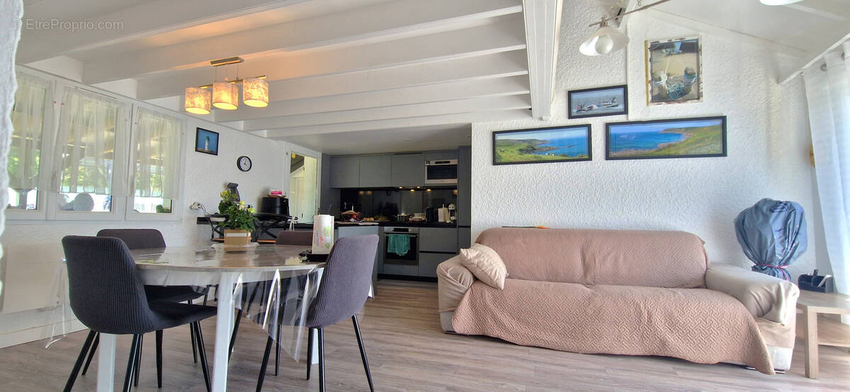 Maison plain-pied avec jardin et garage - photo 2