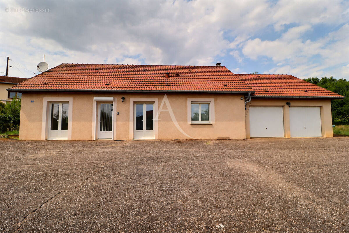 Maison à FLEUREY-LES-FAVERNEY