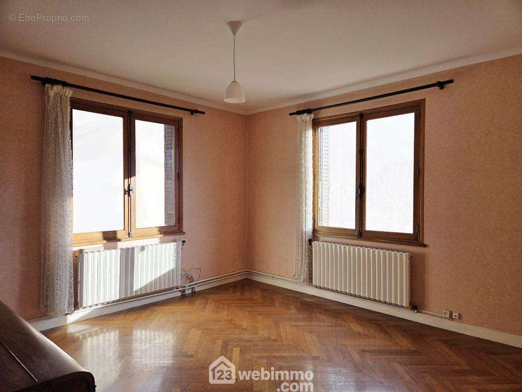 son séjour avec une double exposition, - Maison à LA BATHIE
