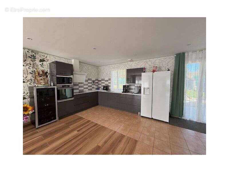 Maison 100 m² à Armeau  - photo 4