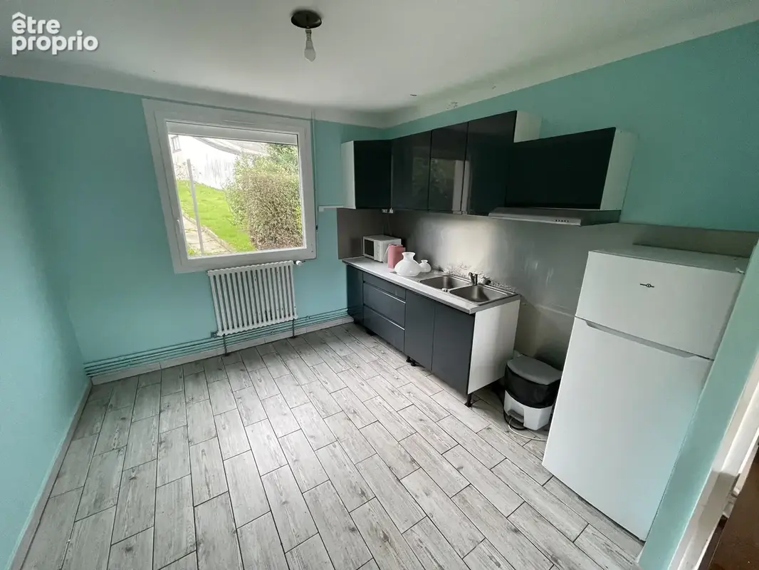 TOURLAVILLE, maison de ville - photo 3