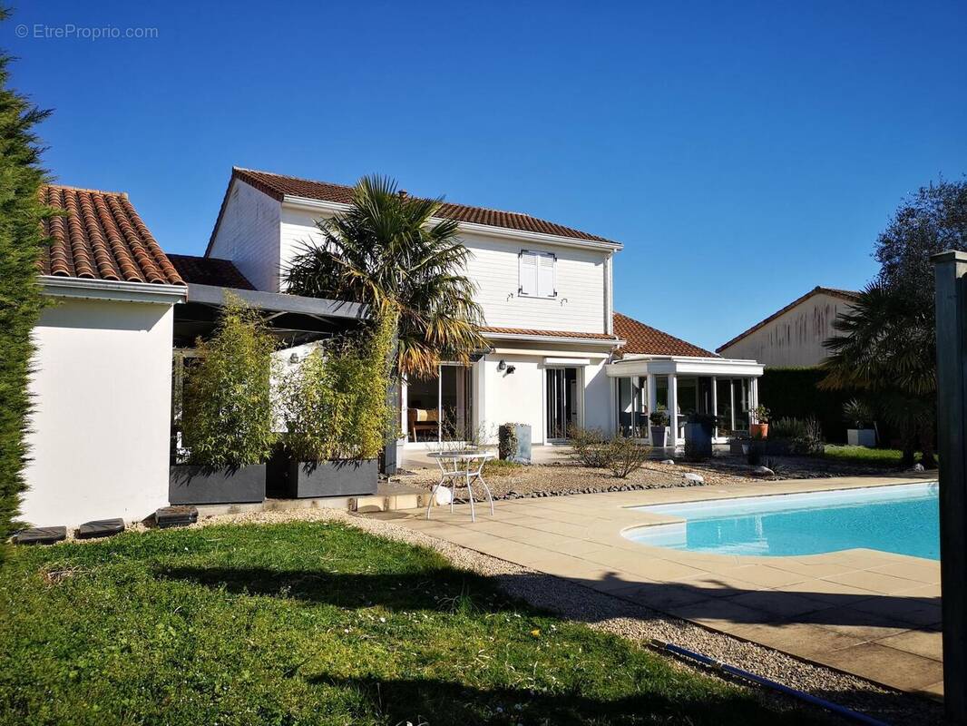 Photo 1 - Maison à BONNEUIL-MATOURS