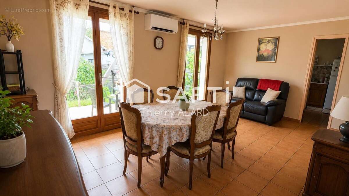 Photo 2 - Maison à BEAUCHAMP