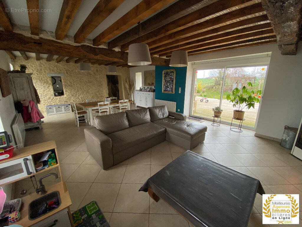 Maison à FRESNAY-SUR-SARTHE