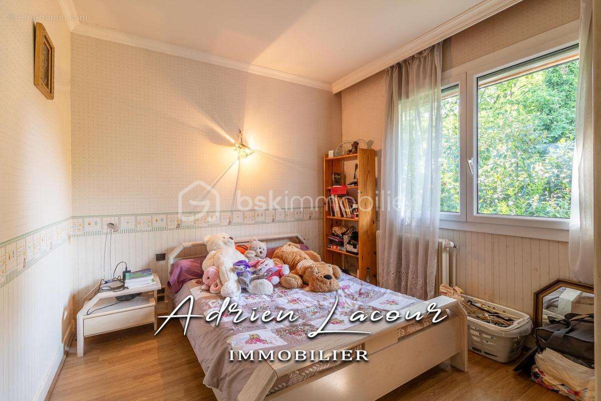 Jolie maison sur sous-sol avec son parc arboré - photo 7