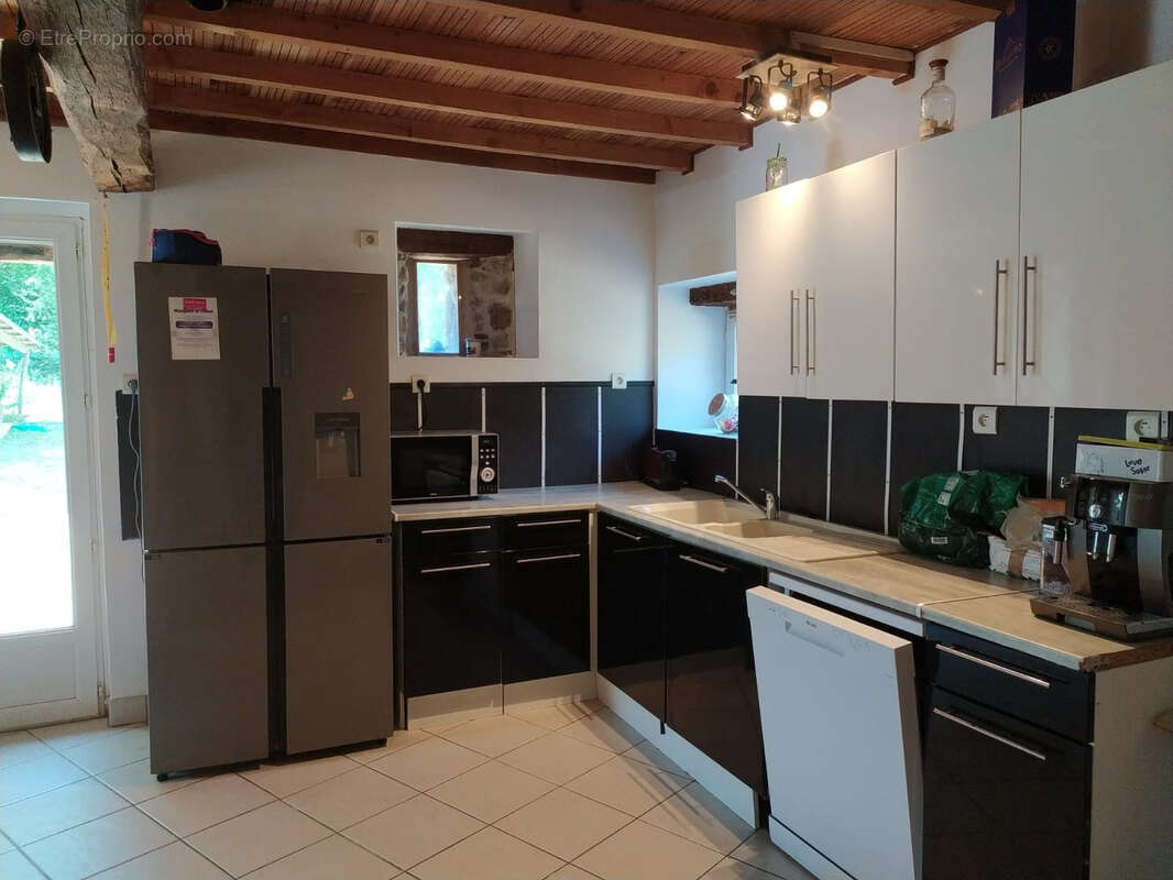 Maison à COMBREE