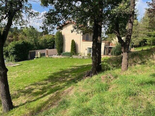 Terrain à bâtir de 860 m² à LA FOUILLOUSE (42) - photo 2