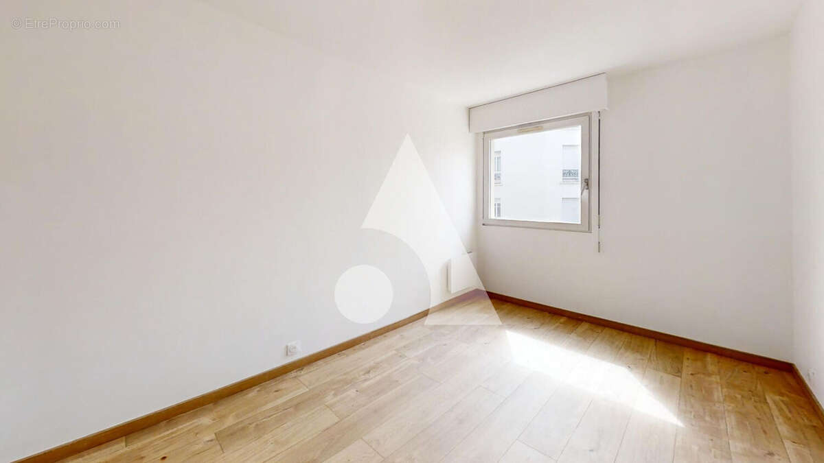Appartement trois pièces avec balcon et cave Rue des Fauvelles 70 m2 - photo 7