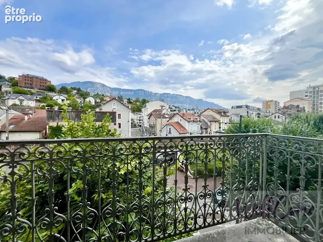 Appartement 61 m² plein de charme avec cave a deux pas des commerces - photo 2