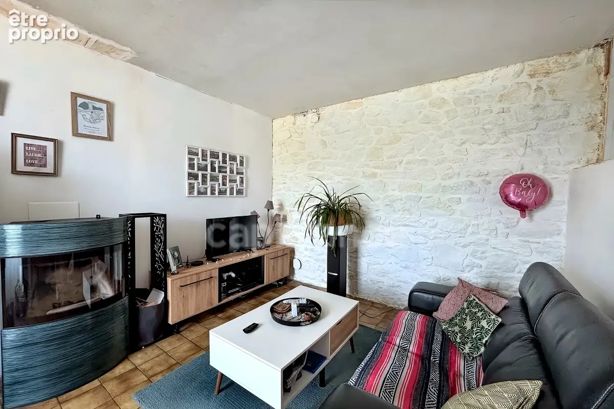 Charmante maison en pierre de 122m², 3 chambres avec jardin, terrasse, cave à GUENGAT(29) - photo 3