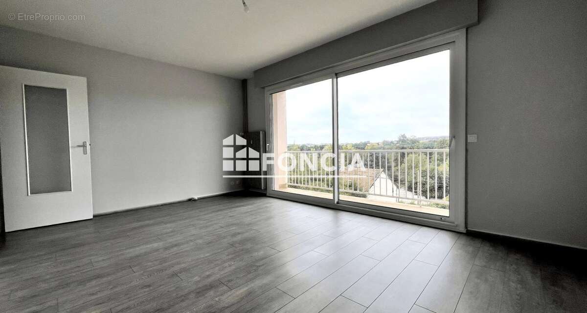 Appartement F3 + garage+cave - photo 2