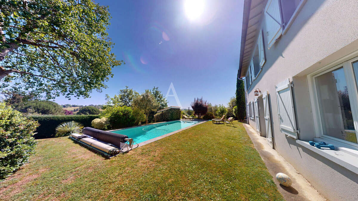Maison 8 pièces de 200m² - photo 14