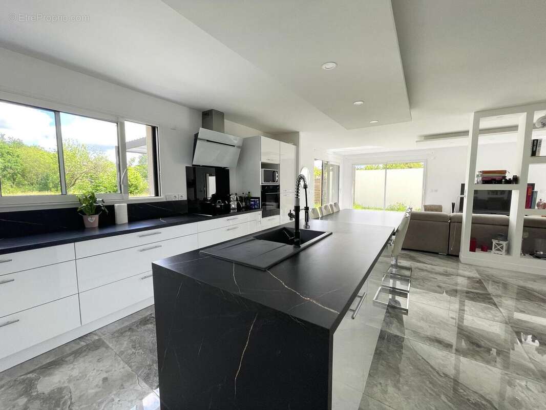 Photo 2 - Maison à BOUGUENAIS