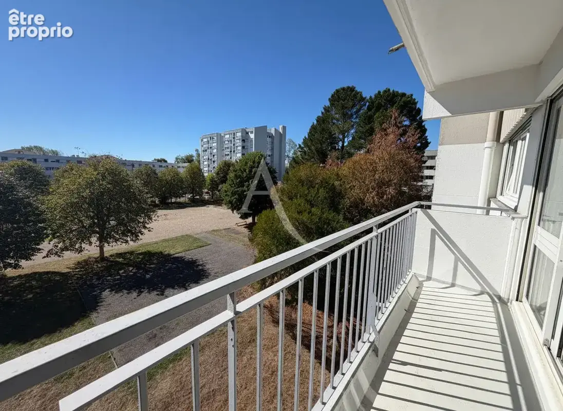 Appartement T4 de 87 m² avec terrasse, 2 caves + stationnement - photo 2