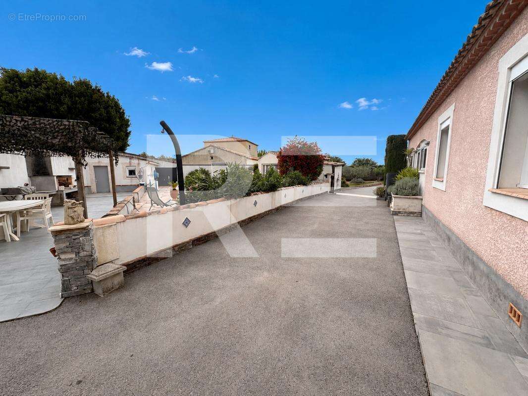 A vendre maison de plain-pied avec piscine sur beauvoisin - photo 6