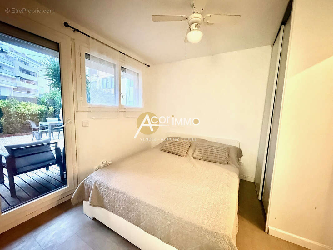 COUP DE COEUR-Bel appartement  2 CHAMBRES en REZ DE JARDIN et 1 Parking privatif - photo 6
