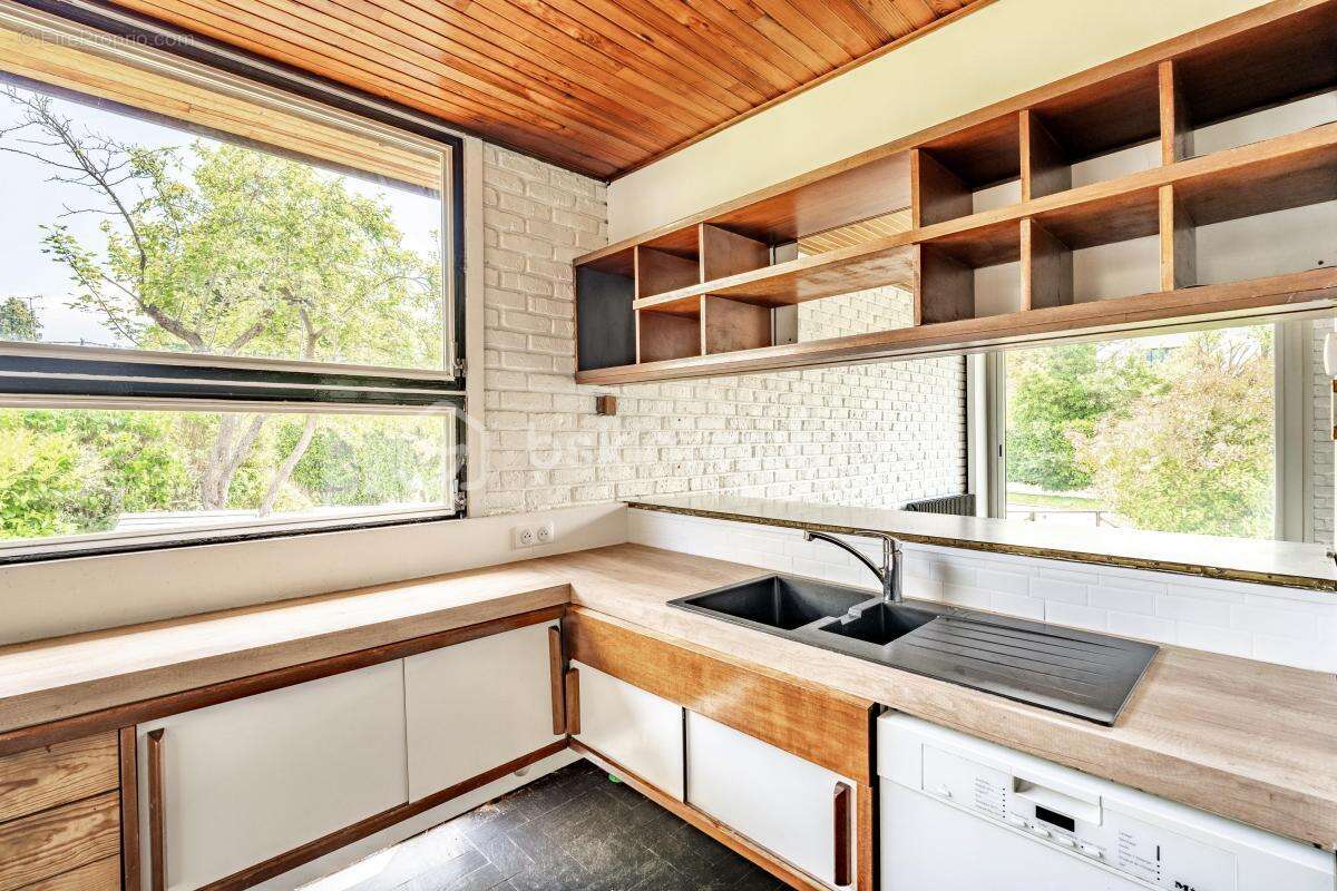 Maison à MARNES-LA-COQUETTE