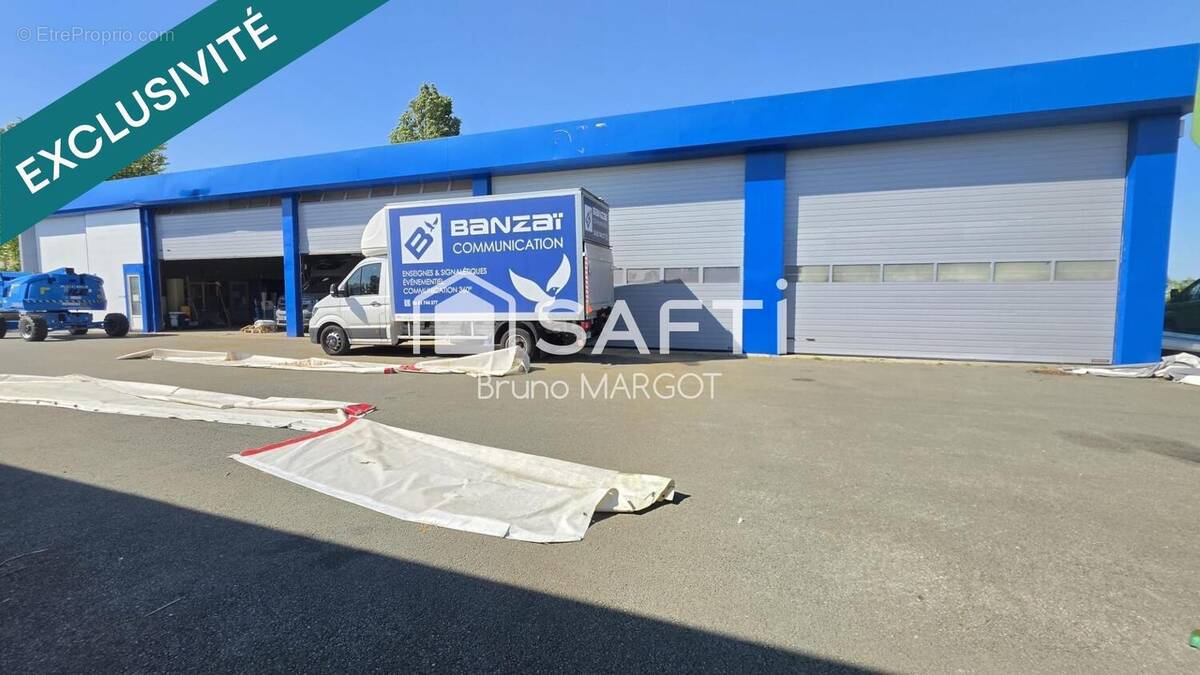 Photo 1 - Commerce à SAINTES