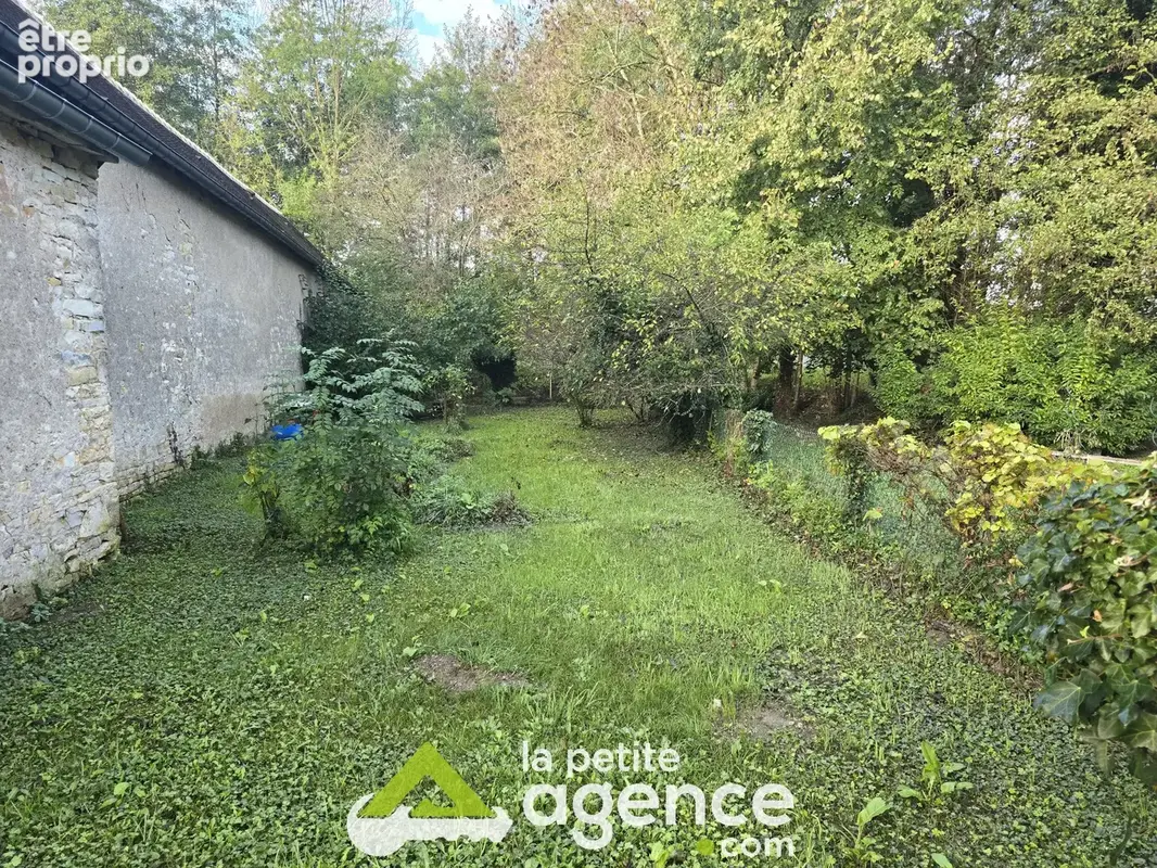 DUN SUR AURON : Terrain avec droit de pêche d'une superficie de 210 m2 clôturé. - photo 2