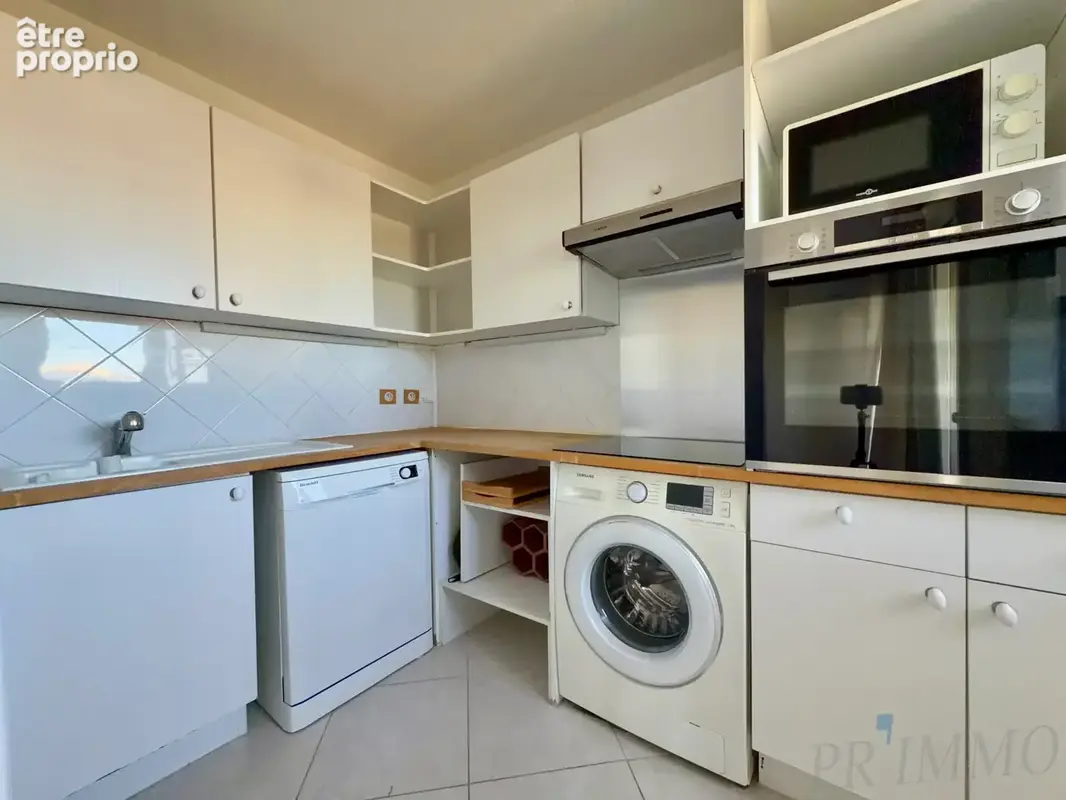 À vendre   appartement 2 pièces avec terrasse, parking et cave - photo 4